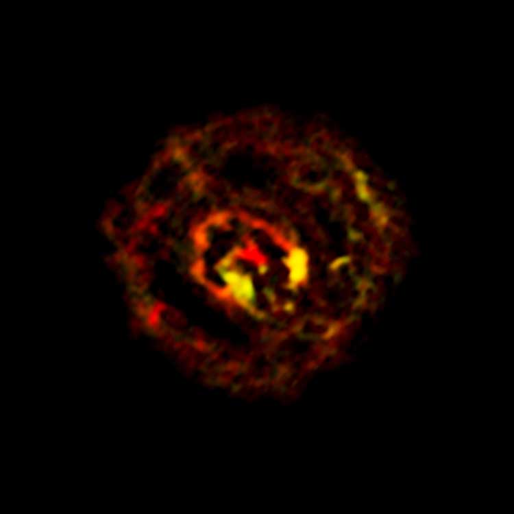 Imagen de ALMA (Atacama Large Millimeter/submillimeter Array) que muestra la distribución del gas molecular cercano al agujero negro supermasivo situado en el centro de la galaxia NGC 1433